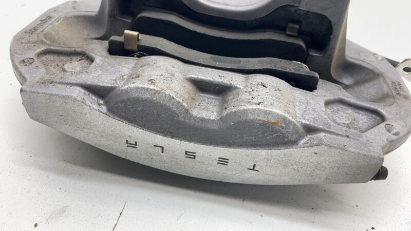 1044621-00-E 17-23 Model 3 Front Driver Side Caliper w/ Brake Hose Line Left LH 1044621-00-E