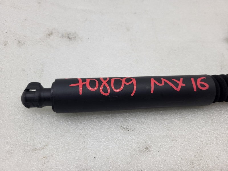 106344000C ⭕ 16-25 Model X Rear Left/Front Right Primary Door Lift Shock Strut 1063440-00-C