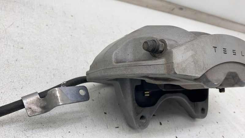 104462100D 2017-2023 Tesla Model 3 M3 Front Driver Side Caliper w/ Brake Hose Line Left LH