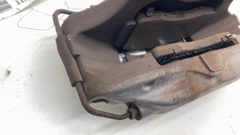 2012-2020 Tesla Model S MS Front Driver Side Caliper w/ Brake Hose Line Left OEM