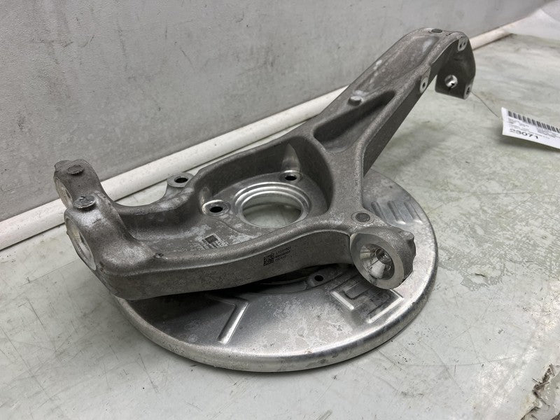 1044661-B 2017-2023 Tesla Model 3 Front Driver Side Spindle Knuckle Rotor Shield Left RWD