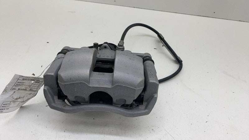 1250641-00-D ⭕ 24-25 Tesla Cybertruck Rear Left Mando Brake Caliper Silver OEM 1250641-00-D