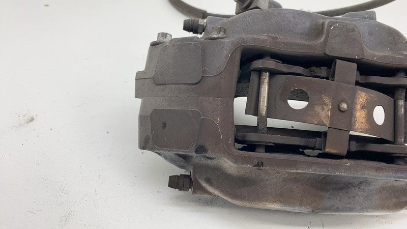 2012-2020 Tesla Model S MS Front Driver Side Caliper w/ Brake Hose Line Left OEM
