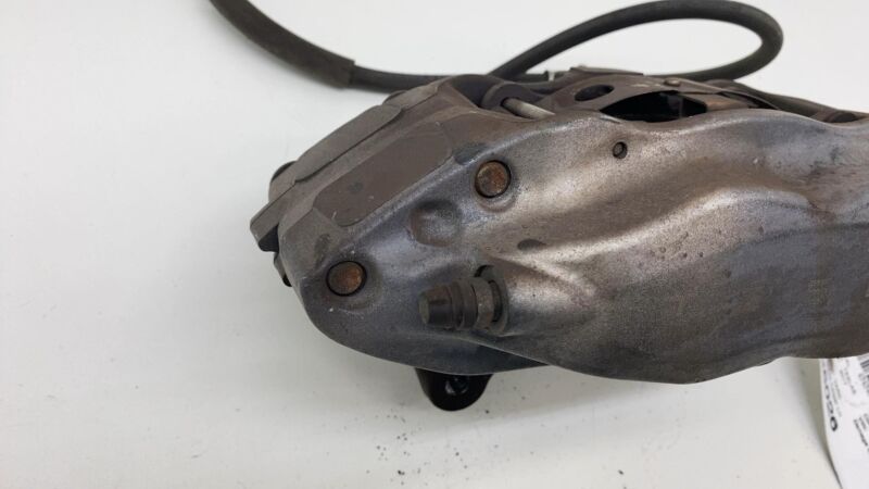 2012-2020 Tesla Model S MS Front Driver Side Caliper w/ Brake Hose Line Left OEM