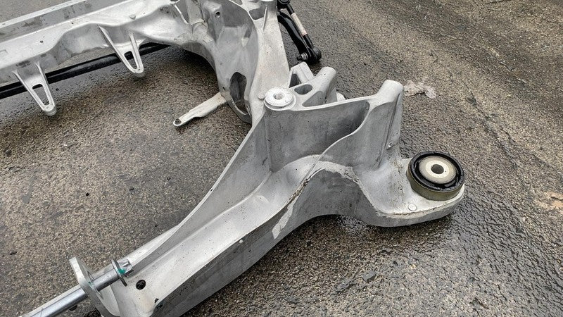142056100C 2021-2023 Tesla Model S Rear Subframe Crossmember Cradle w/ Stabilizer Bar OEM