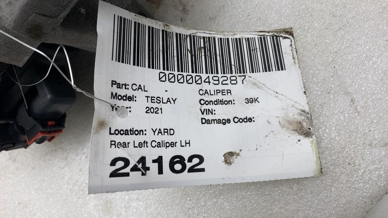 1044623 2017-2024 Tesla Model 3 Y Rear Driver Side Caliper w/ Brake Line Hose Left Assy
