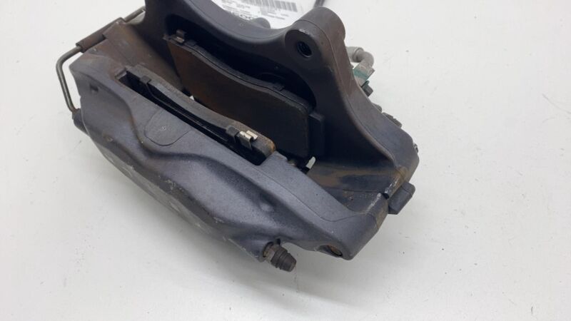 2012-2015 Tesla Model S MS Front Driver Side Caliper w/ Brake Hose Line Left LH