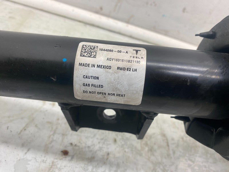 104409000A 17-20 Model 3 Left Shock Absorber w/ Control Arm Mid-Range Btry RWD 1044090-00-A