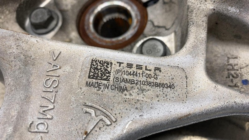 104412300B 2017-2023 Tesla Model 3 Rear Left Suspension Knuckle Spindle w/ Shield & ABS RWD