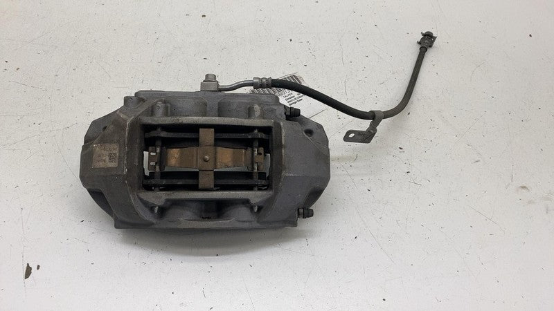 104462200E 2017-2023 Tesla Model 3 Front Side Caliper w/ Brake Hose Line Right 1044622-00-E