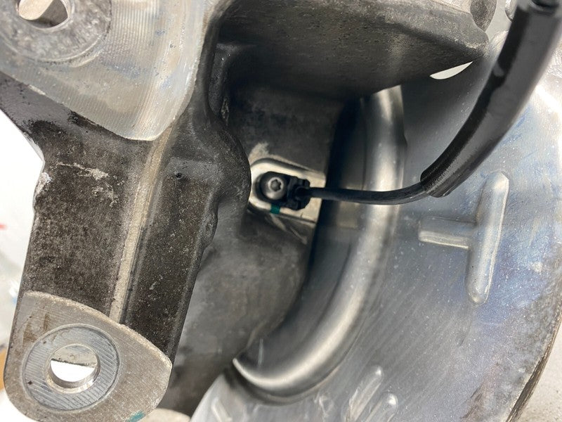 102741100D 16-20 Model X Rear Left Spindle Knuckle w/ Wheel Hub & Dust Shield  1027411-00-D