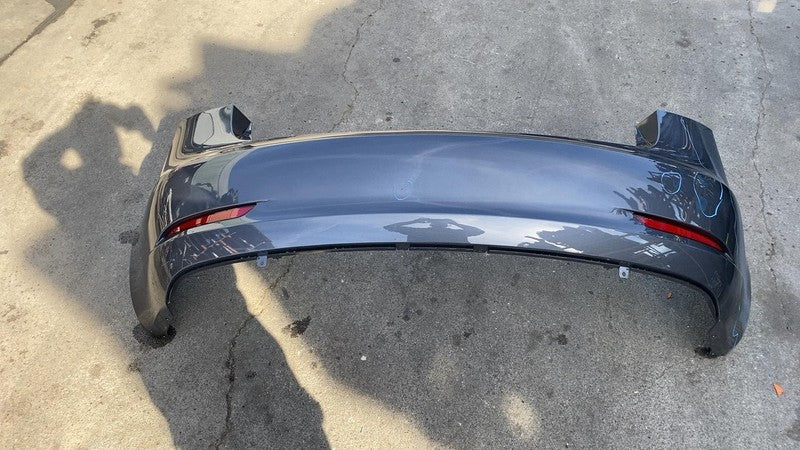 2023 Tesla Model 3 Rear Bumper Cover w/ Light Reflectors Assembly Gray PMNG OEM