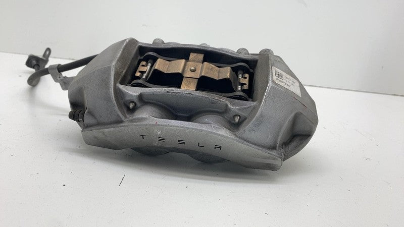 104462100E ⭕ 2017-2023 Tesla Model 3 Front Left Caliper w/ Brake Hose Line LH 1044621-00-E