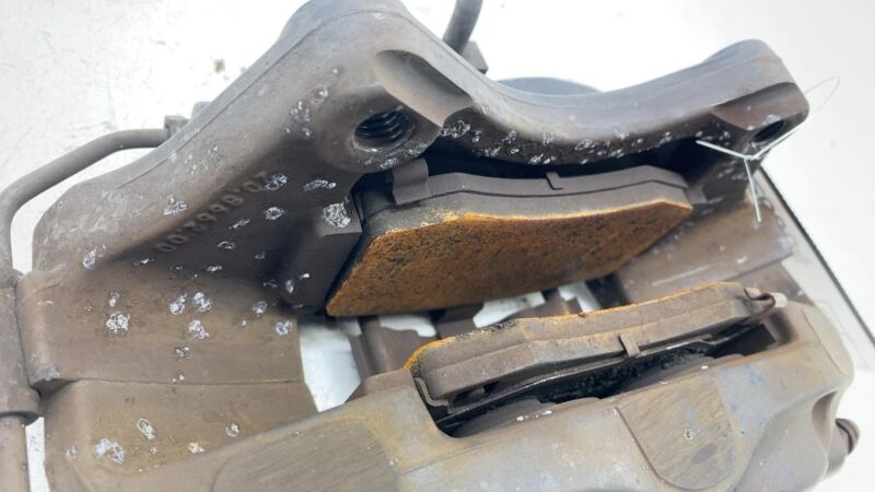 2012-2020 Tesla Model S MS Rear Driver Side Caliper w/ Brake Hose Line Left OEM
