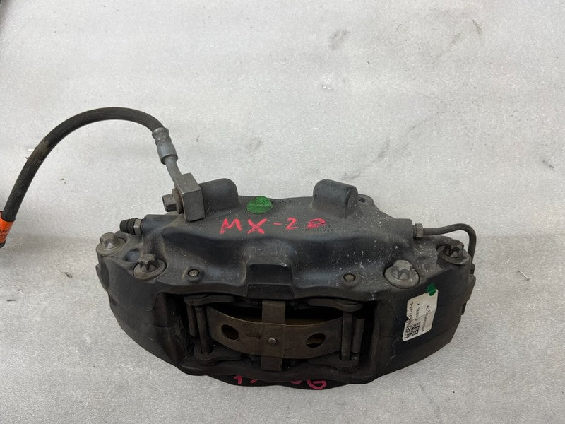 102762100D ⭕16-20 Model X MX Front Driver Side Caliper w/ Brake Hose Line Left 1027621-00-D