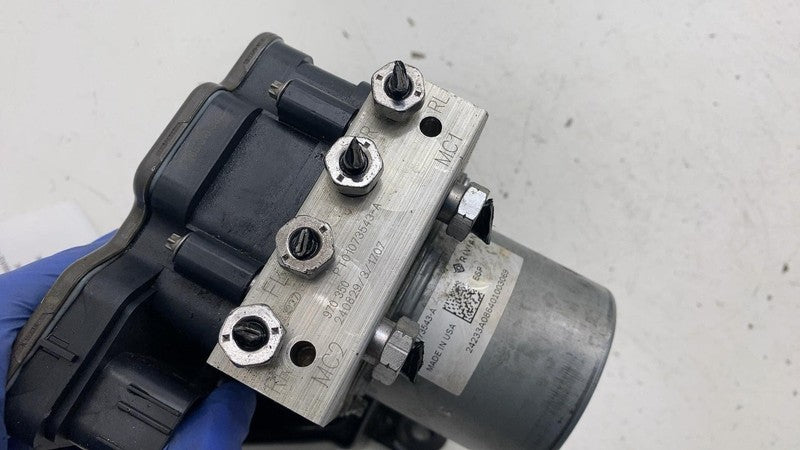 PT01073543A ⭕ 2025 Rivian R1S ABS Anti-Lock Brake Pump Module Unit w/ Bracket PT01073543-A