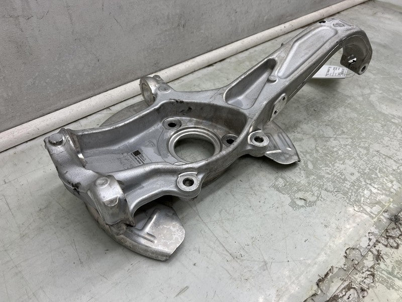 1044316 00 E 2017-2023 Tesla Model 3 Front Passenger Spindle Knuckle Rotor Shield Right RWD