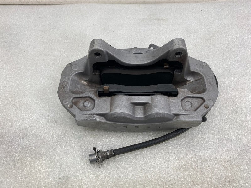 104462100D ⭕ 2017-2023 Model 3 Front Left Caliper w/ Brake Hose Line Left Base 1044621-00-D