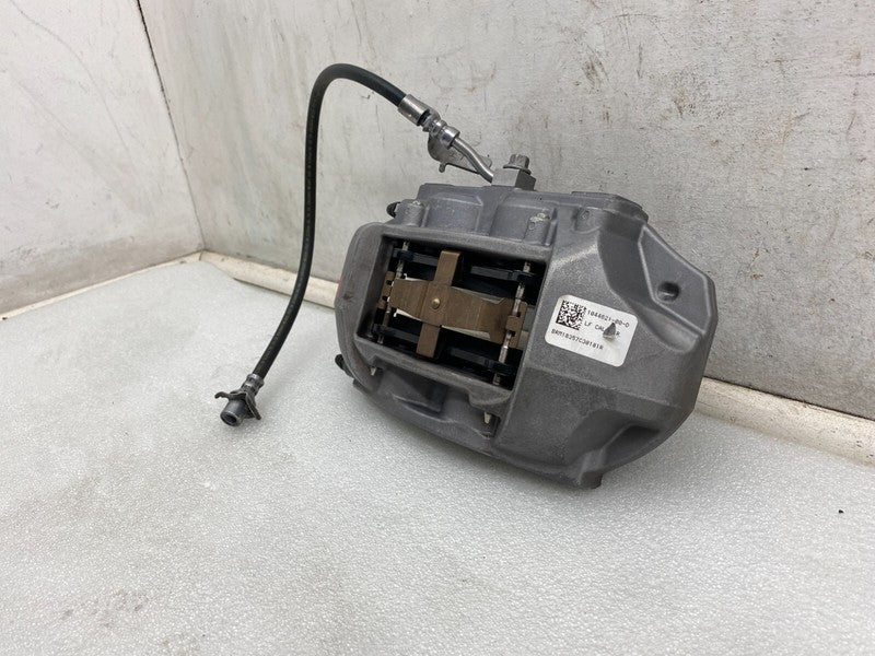 104462100D ⭕ 2017-2023 Model 3 Front Left Caliper w/ Brake Hose Line Left Base 1044621-00-D