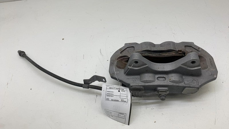 104462100E ⭕ 2017-2023 Tesla Model 3 Front Left Caliper w/ Brake Hose Line OEM 1044621-00-E