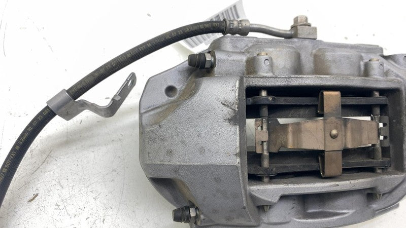 104462100E ⭕ 2017-2023 Tesla Model 3 Front Left Caliper w/ Brake Hose Line LH 1044621-00-E