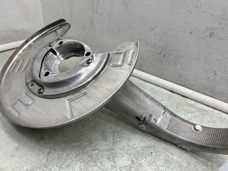 1044316 00 E 2017-2023 Tesla Model 3 Front Passenger Spindle Knuckle Rotor Shield Right RWD