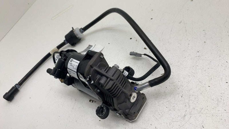 PT00563789-A ⭕ 2025 Rivian R1S  Air Ride Suspension Compressor Pump w/ Hose Tube OEM Assembly
