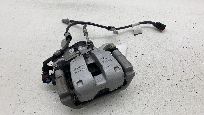 104462300I ⭕ 2017-2025 Tesla Model 3 Rear Left Caliper w/ Brake Line Hose BASE 1044623-00-I