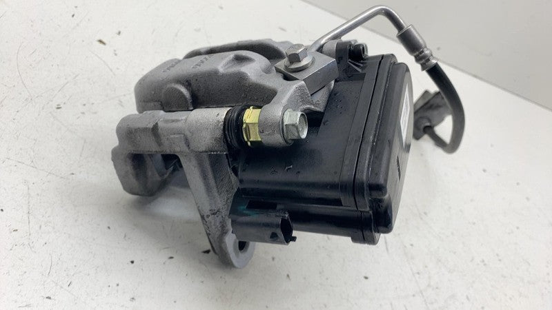 PT00030005-C ⭕ 2024-2025 Rivian R1S Rear Driver Side Caliper w/ Brake Line Left PT00030005-C