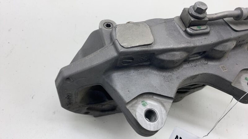 1044621-00-E 17-23 Model 3 Front Driver Side Caliper w/ Brake Hose Line Left LH 1044621-00-E