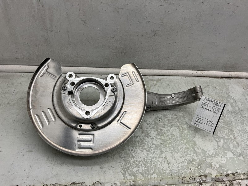 1044316 00 E 2017-2023 Tesla Model 3 Front Passenger Spindle Knuckle Rotor Shield Right RWD