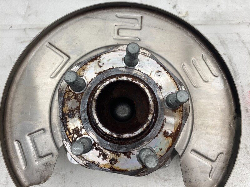 104431600E ⭕ 17-23 Model 3 Front Right Spindle Knuckle Hub & Dust Shield RWD 1044316-00-E