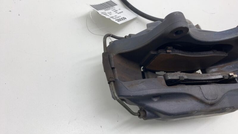 2012-2015 Tesla Model S MS Front Driver Side Caliper w/ Brake Hose Line Left LH