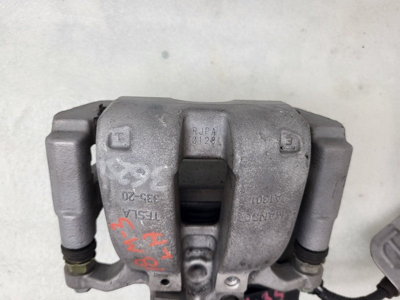 104462397F ⭕ 2017-2025 Tesla Model 3 Rear Left Caliper w/ Brake Line Hose BASE 1044623-97-F