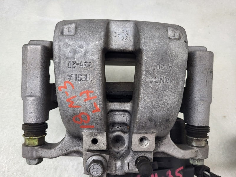 104462397F ⭕ 2017-2025 Tesla Model 3 Rear Left Caliper w/ Brake Line Hose BASE 1044623-97-F