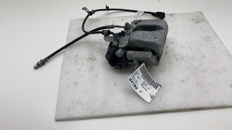 1044623 2017-2024 Tesla Model 3 Y Rear Driver Side Caliper w/ Brake Line Hose Left Assy