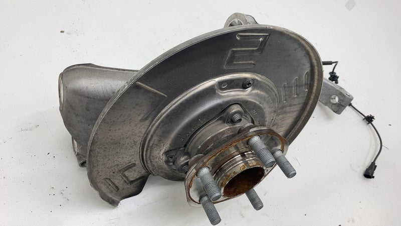 104412200E 17-23  Model 3 Front Left Spindle Knuckle w/ Wheel Hub & Shield RWD 1044311-00-E