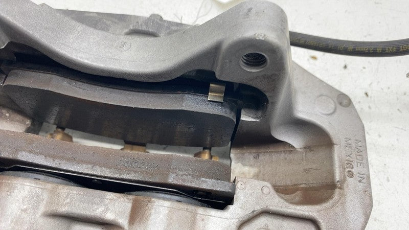104462100D 2017-2023 Tesla Model 3 M3 Front Driver Side Caliper w/ Brake Hose Line Left LH