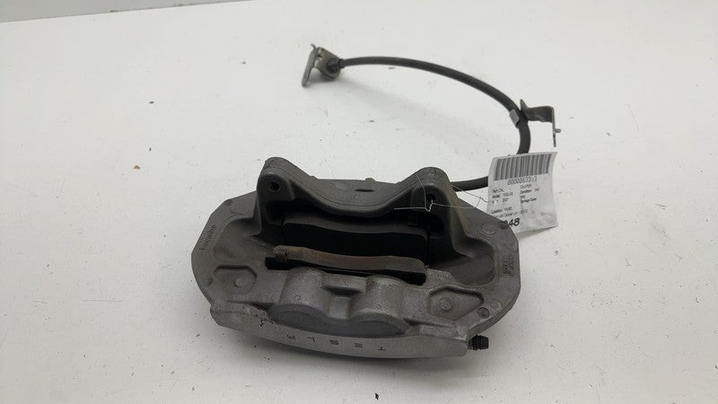 104462100E ⭕ 2017-2023 Tesla Model 3 Front Left Caliper w/ Brake Hose Line LH 1044621-00-E