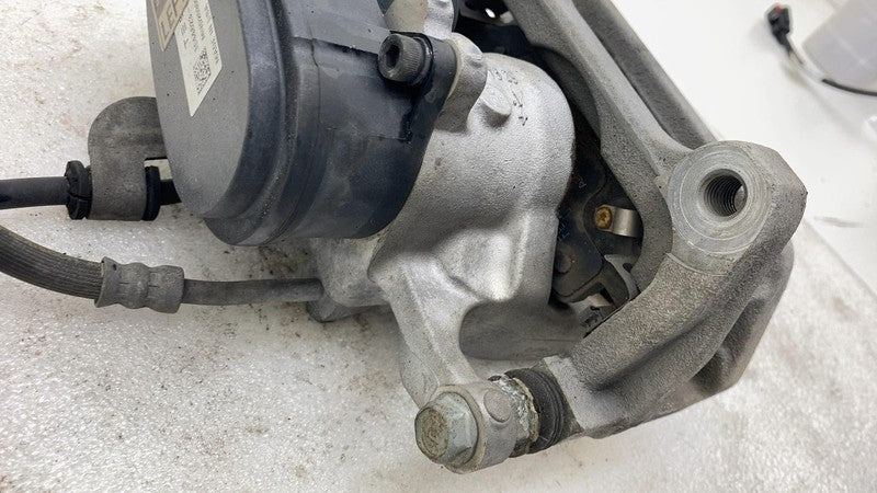 1044623 2017-2024 Tesla Model 3 Y Rear Driver Side Caliper w/ Brake Line Hose Left Assy