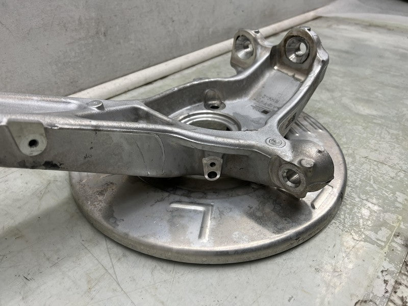 1044316 00 E 2017-2023 Tesla Model 3 Front Passenger Spindle Knuckle Rotor Shield Right RWD