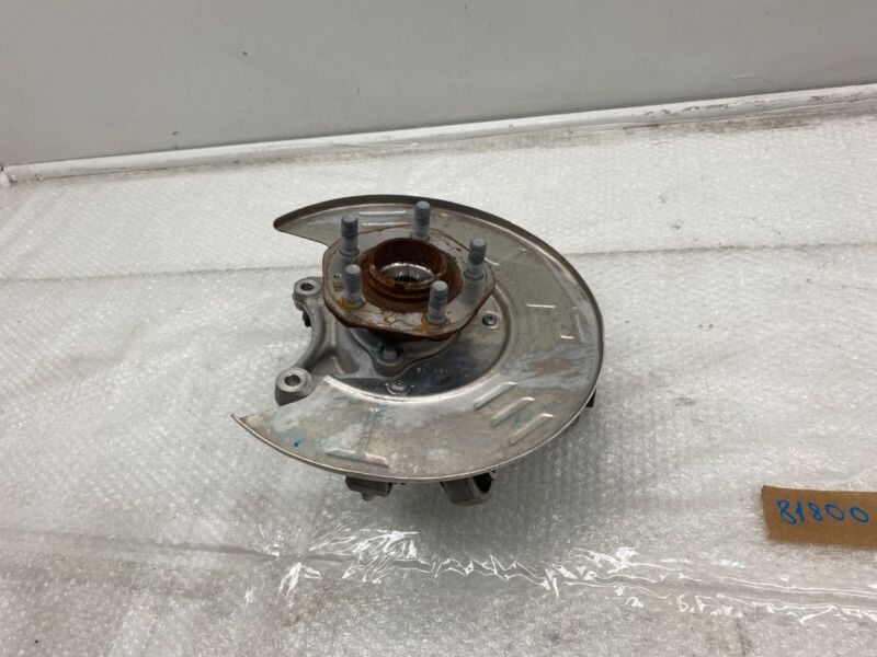 104441100F 2017-2023 Tesla Model 3 Rear Left Knuckle Wheel Hub Fore Toe AFT Link Spring OEM