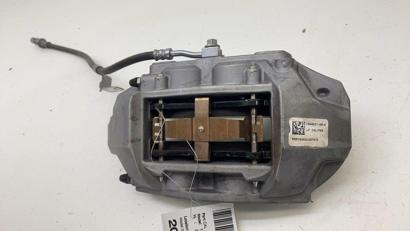 104462100E ⭕ 2017-2023 Tesla Model 3 Front Left Caliper w/ Brake Hose Line OEM 1044621-00-E