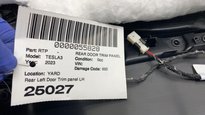 160861700A 2021-2023 Tesla Model 3 Rear Driver Side Interior Door Panel Trim Card Left LH