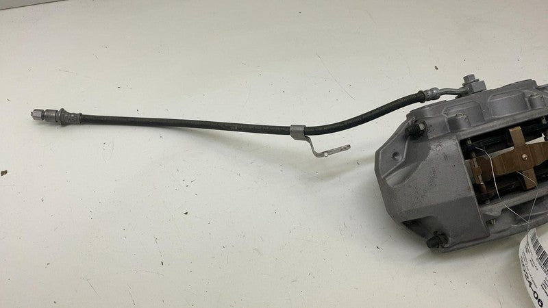 104462100E ⭕ 2017-2023 Tesla Model 3 Front Left Caliper w/ Brake Hose Line OEM 1044621-00-E