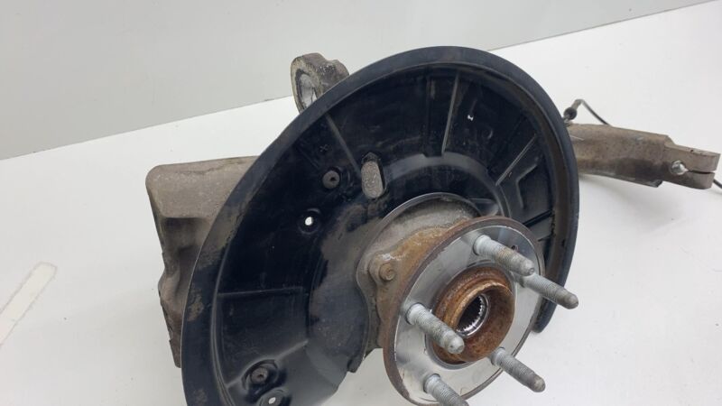 102731100F ⭕16-20 Model X Front Left Knee Knuckle w/ ABS Sensor & Rotor Shield 1027311-00-F
