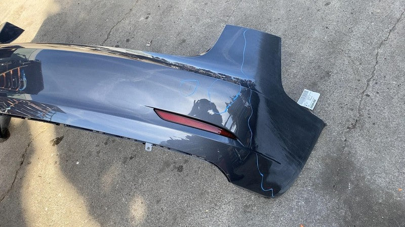 2023 Tesla Model 3 Rear Bumper Cover w/ Light Reflectors Assembly Gray PMNG OEM
