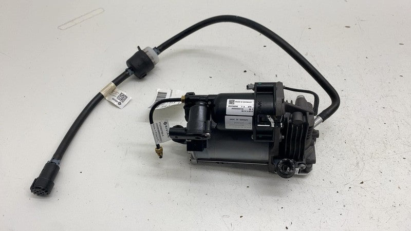 PT00563789-A ⭕ 2025 Rivian R1S  Air Ride Suspension Compressor Pump w/ Hose Tube OEM Assembly