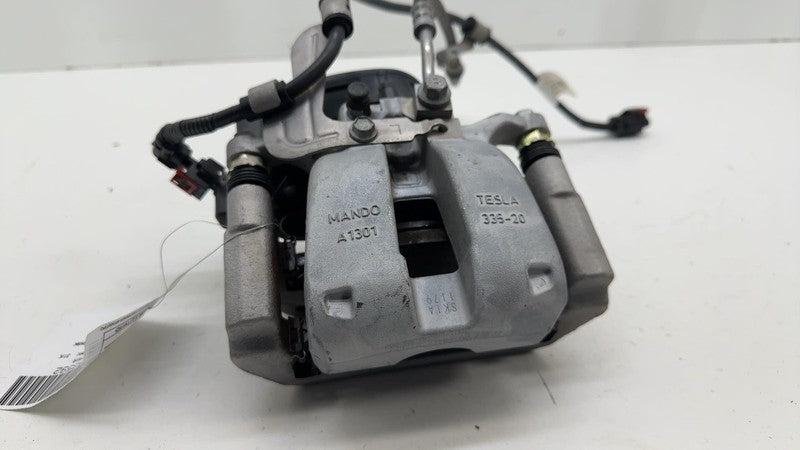 1044623-00-H ⭕ 2017-2025 Tesla Model 3 Rear Left Caliper w/ Brake Line Hose BASE 1044623-00-H