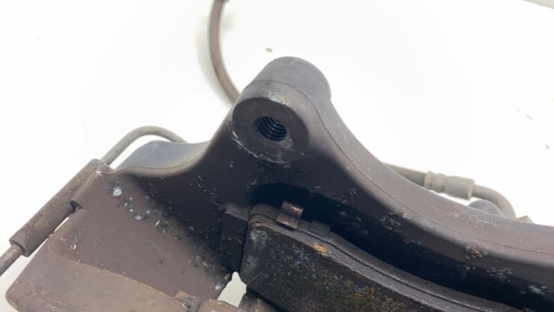 2012-2015 Tesla Model S MS Front Driver Side Caliper w/ Brake Hose Line Left LH